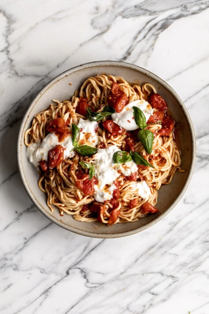 Homemade Spaghetti with Confit Cherry Tomatoes, Burrata & Basil