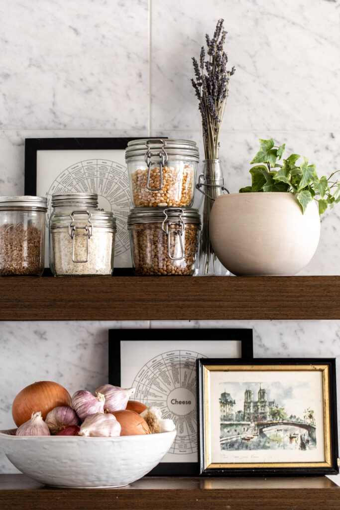 shelves with storage jars of lentils and grains