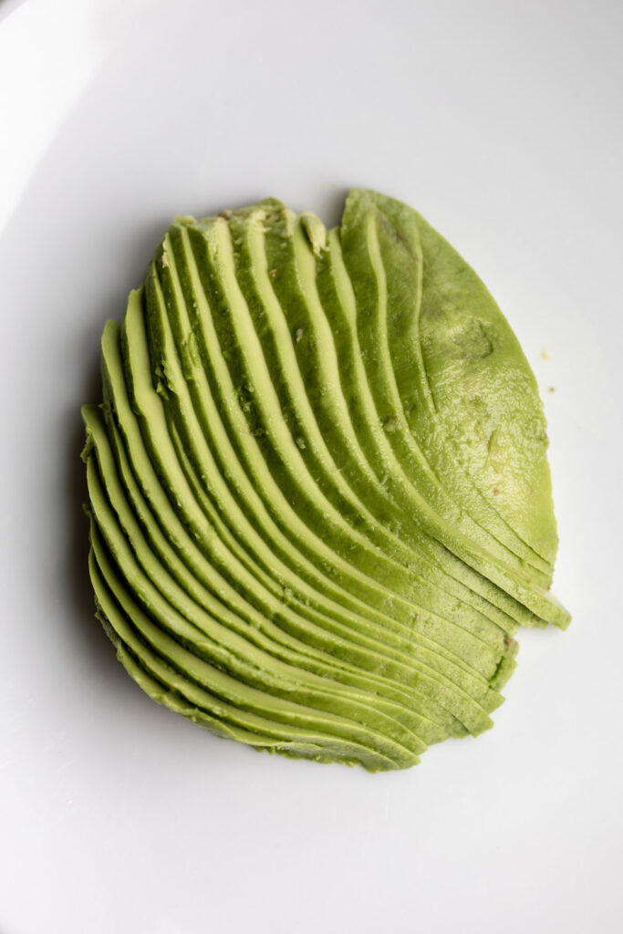 thinly sliced fanned avocado slices