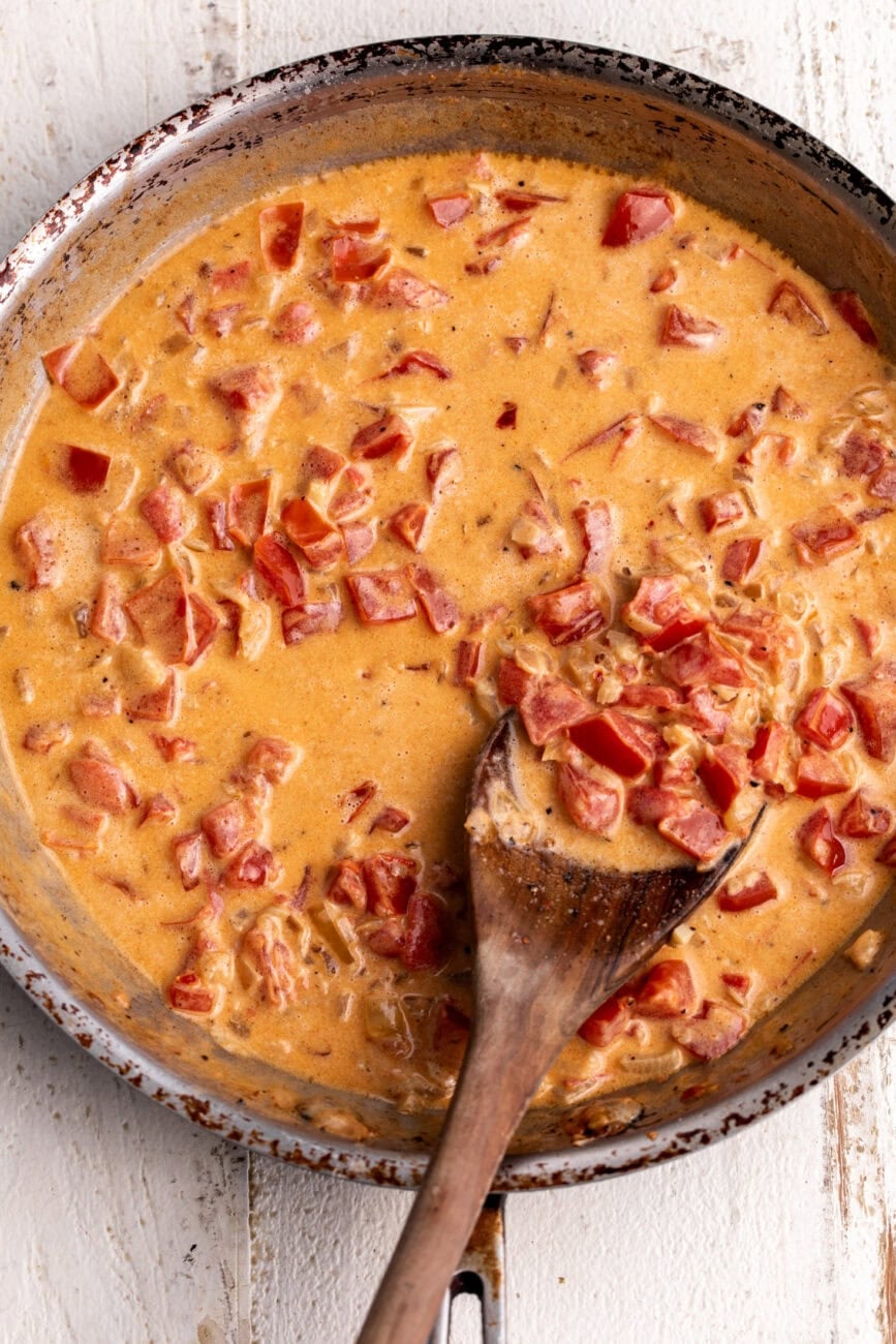 tomato cream sauce in sauté pan finished with creme fraiche.