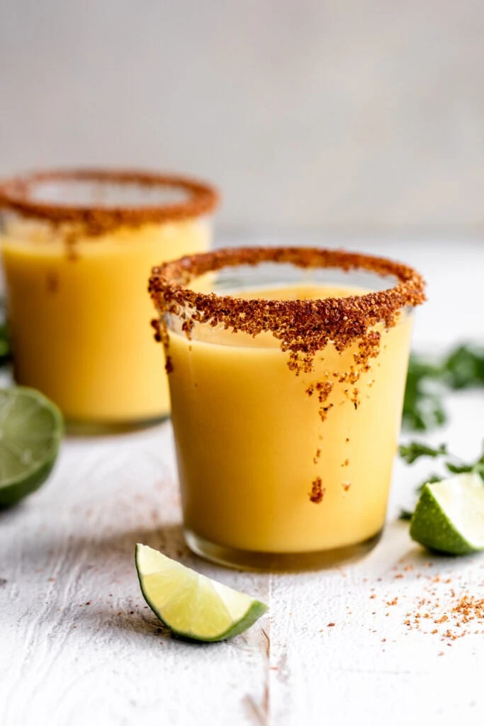 frozen margarita tequila cocoktail with tajin honey rim