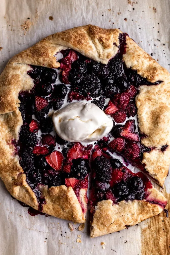 mixed berry galette with raspberries strawberries blueberries and blackberries in pastry dough
