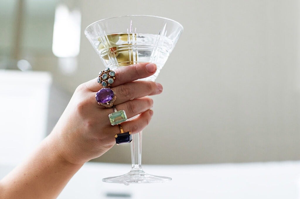 dirty martini glass with cocktail rings.