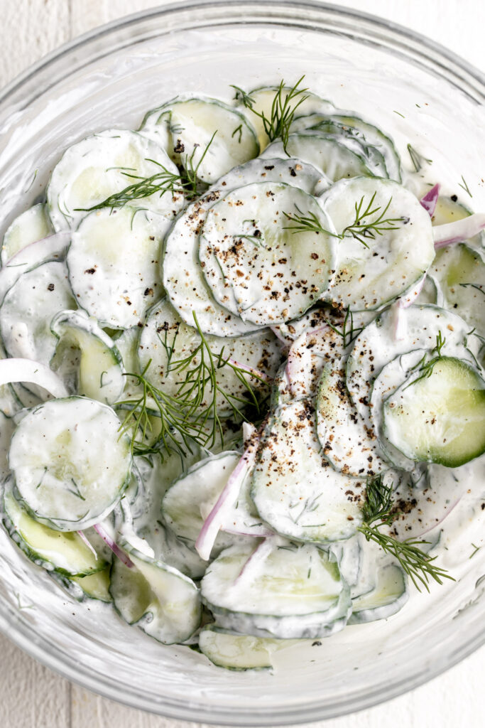 Dressing made from sour cream and vinegar mixture with fresh dill.