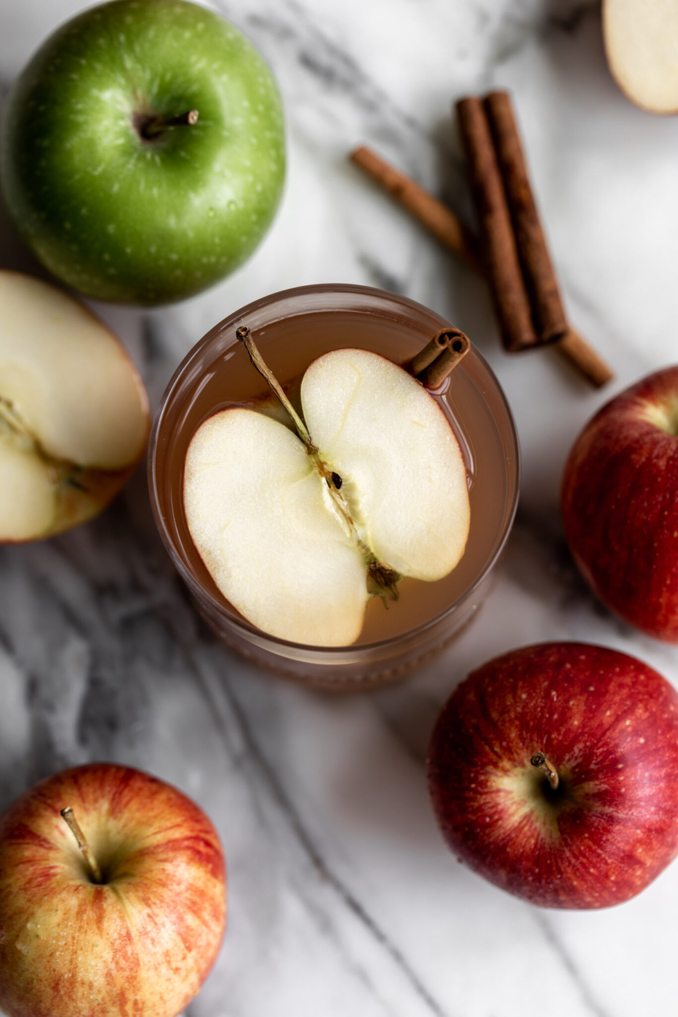 Homemade Spiced Apple Cider Cooking with Cocktail Rings