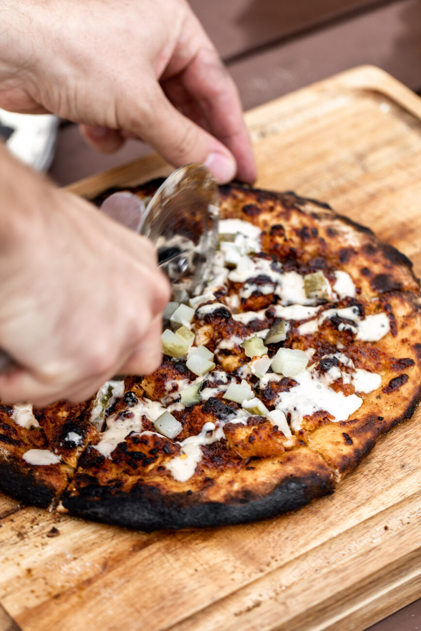 nashville hot chicken pizza with pickles.