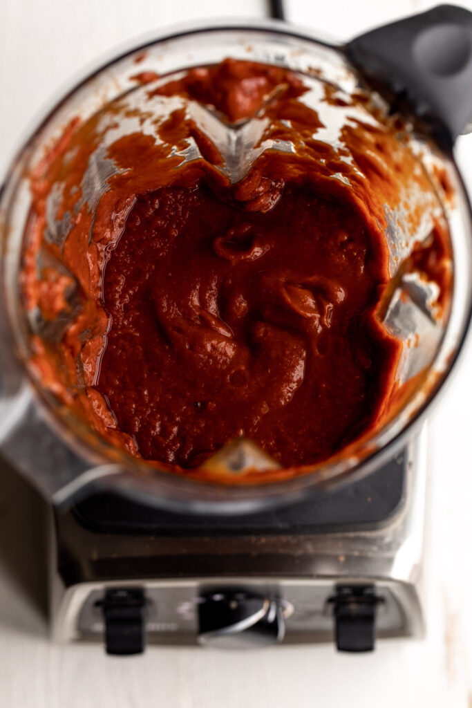 Birria Tacos Recipe braising chili mixture.