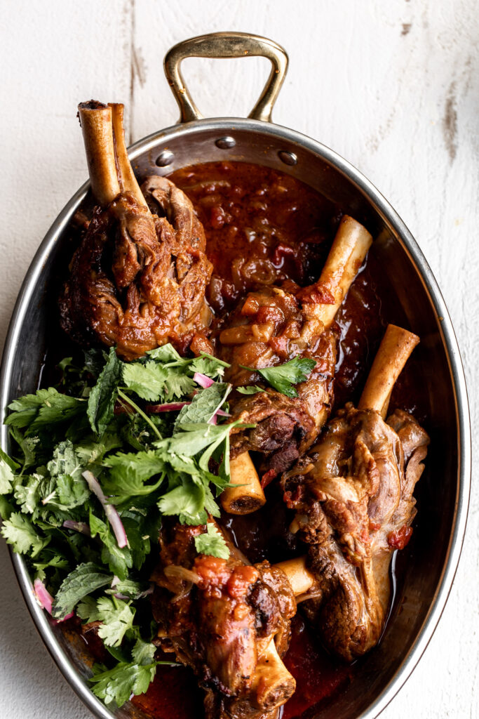 Braised Moroccan-Spiced Lamb Shanks with Herb Salad