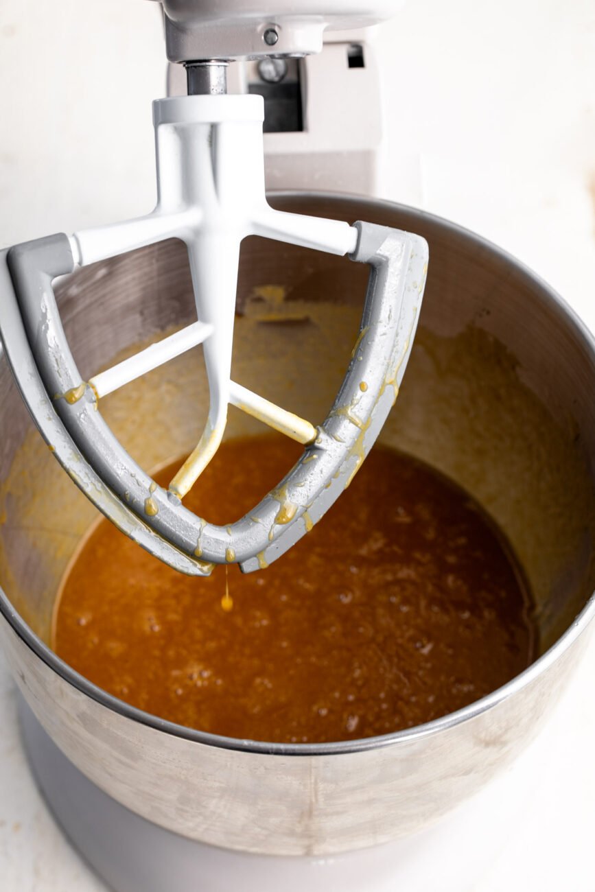 mixed wet ingredients for pumpkin muffins mixing bowl.