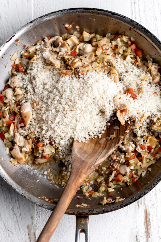 Baked Stuffed Clams filling in sauté pan.