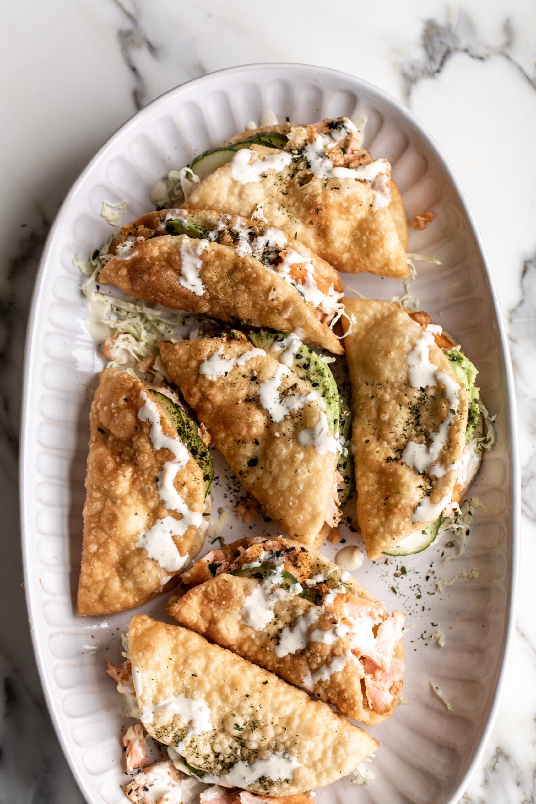 Salmon Wonton Tacos with Yuzu Mayo.