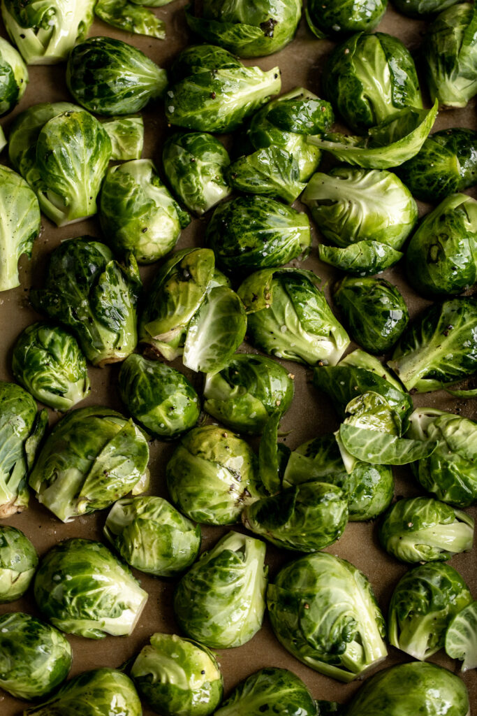halved Brussels sprouts on baking sheet