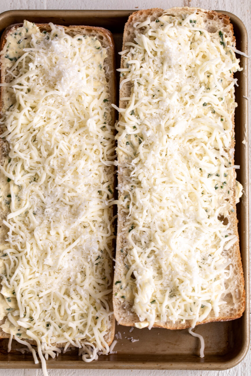 garlic bread with shredded mozzarella and grated parmesan cheese.
