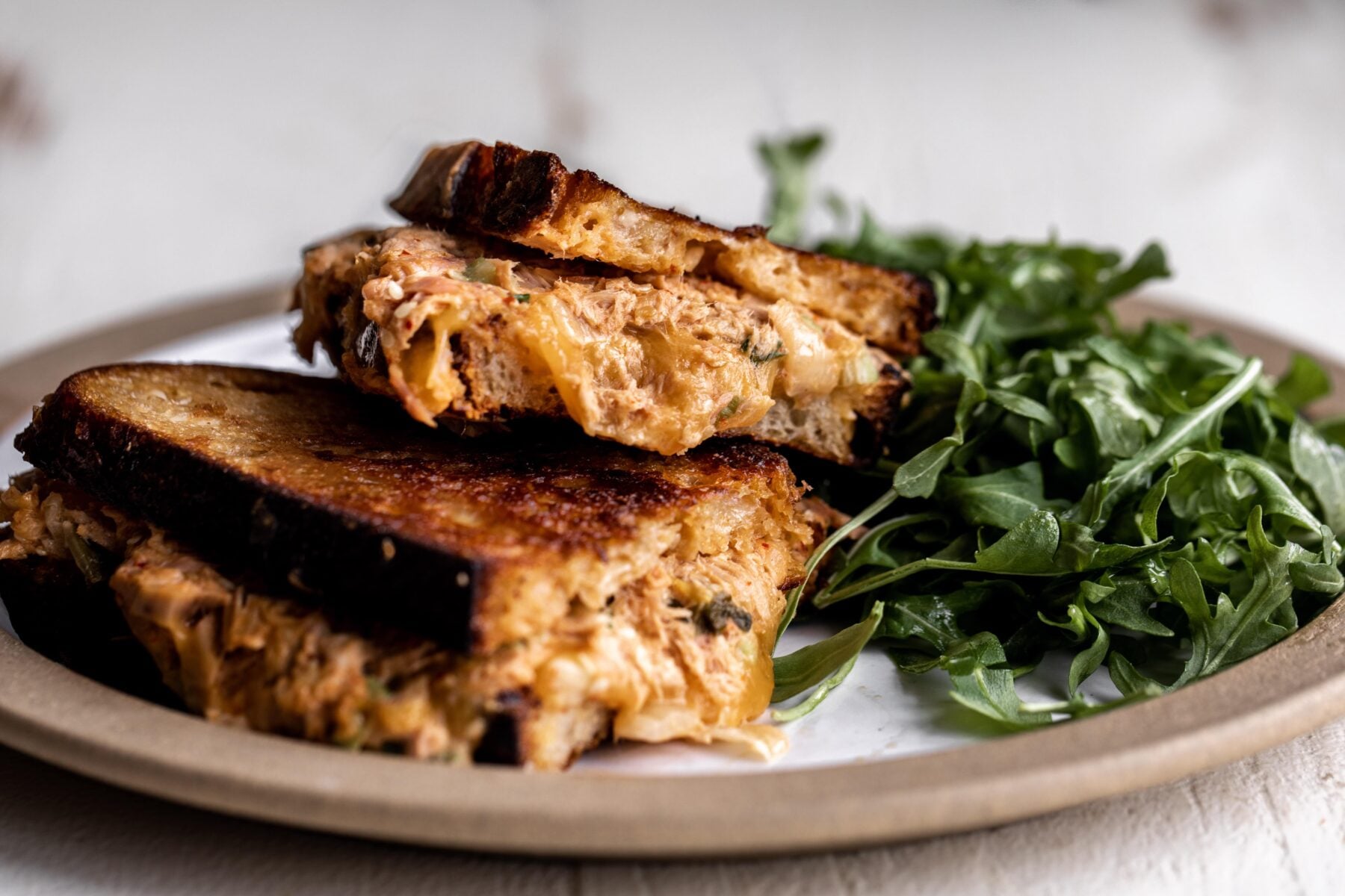 Kimchi Tuna Salad tuna melt with cheese.