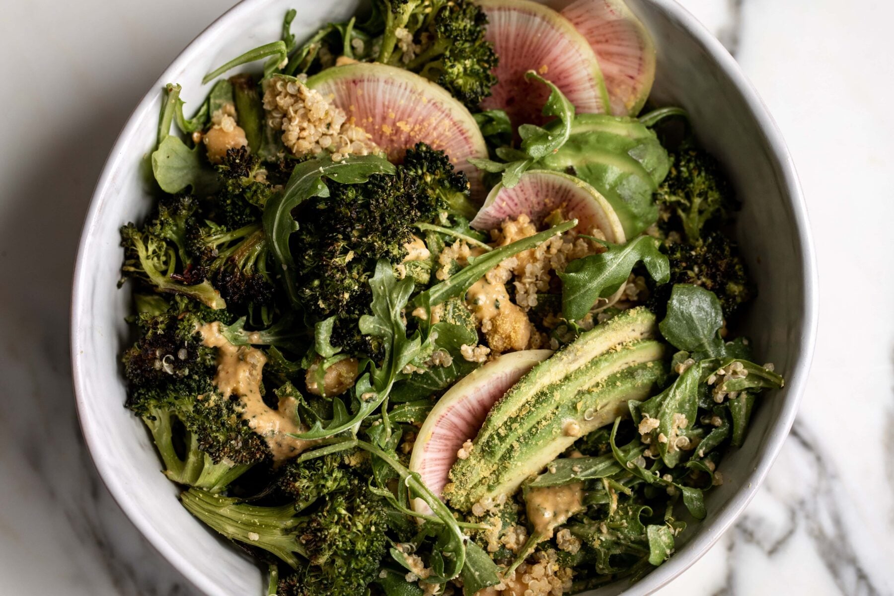 Roasted Broccoli Grain Bowl with Arugula.