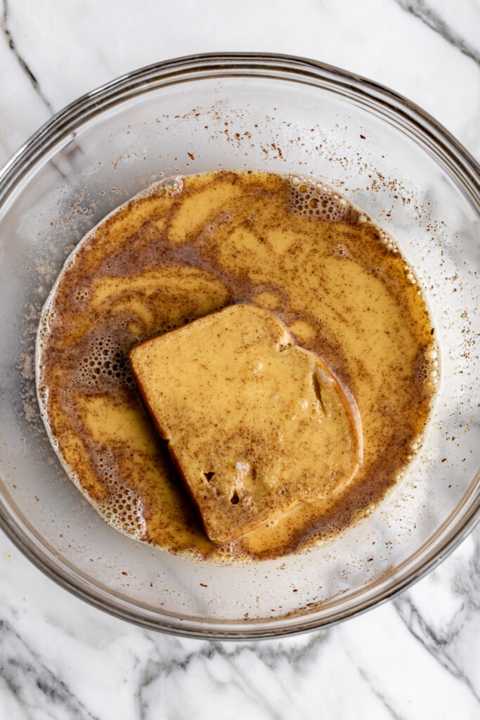 slices of bread in egg mixture