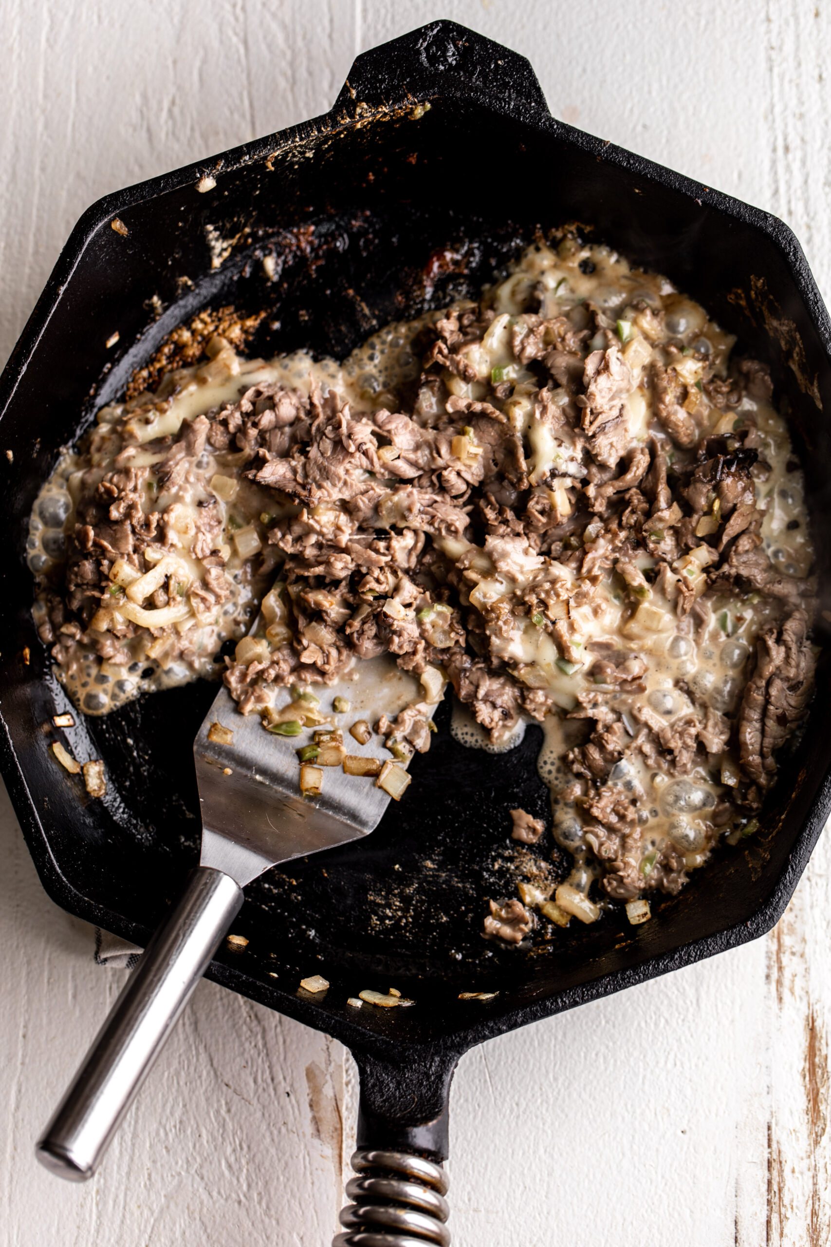 Cheesesteak Egg Rolls Cooking with Cocktail Rings