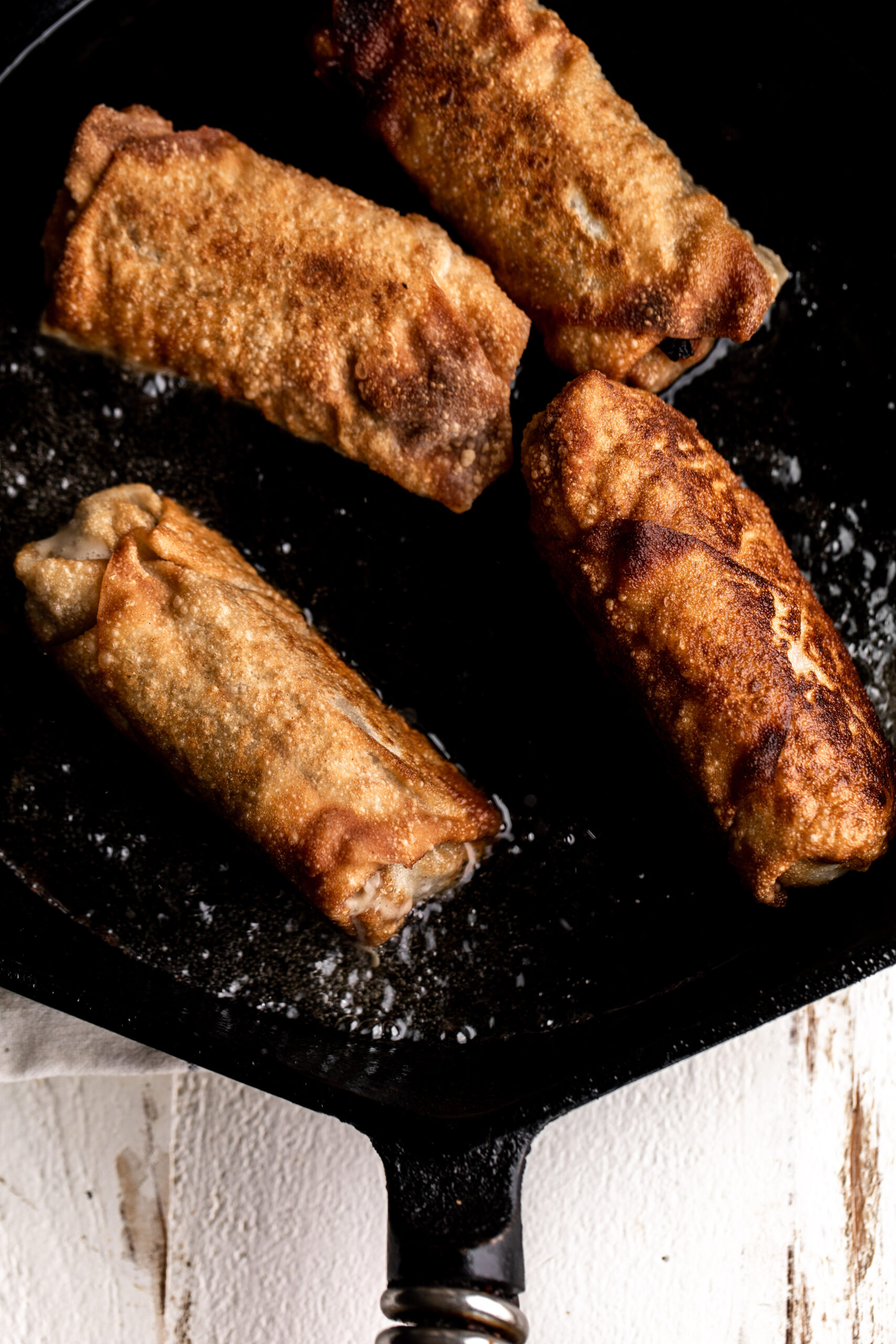 Cheesesteak Egg Rolls Cooking with Cocktail Rings