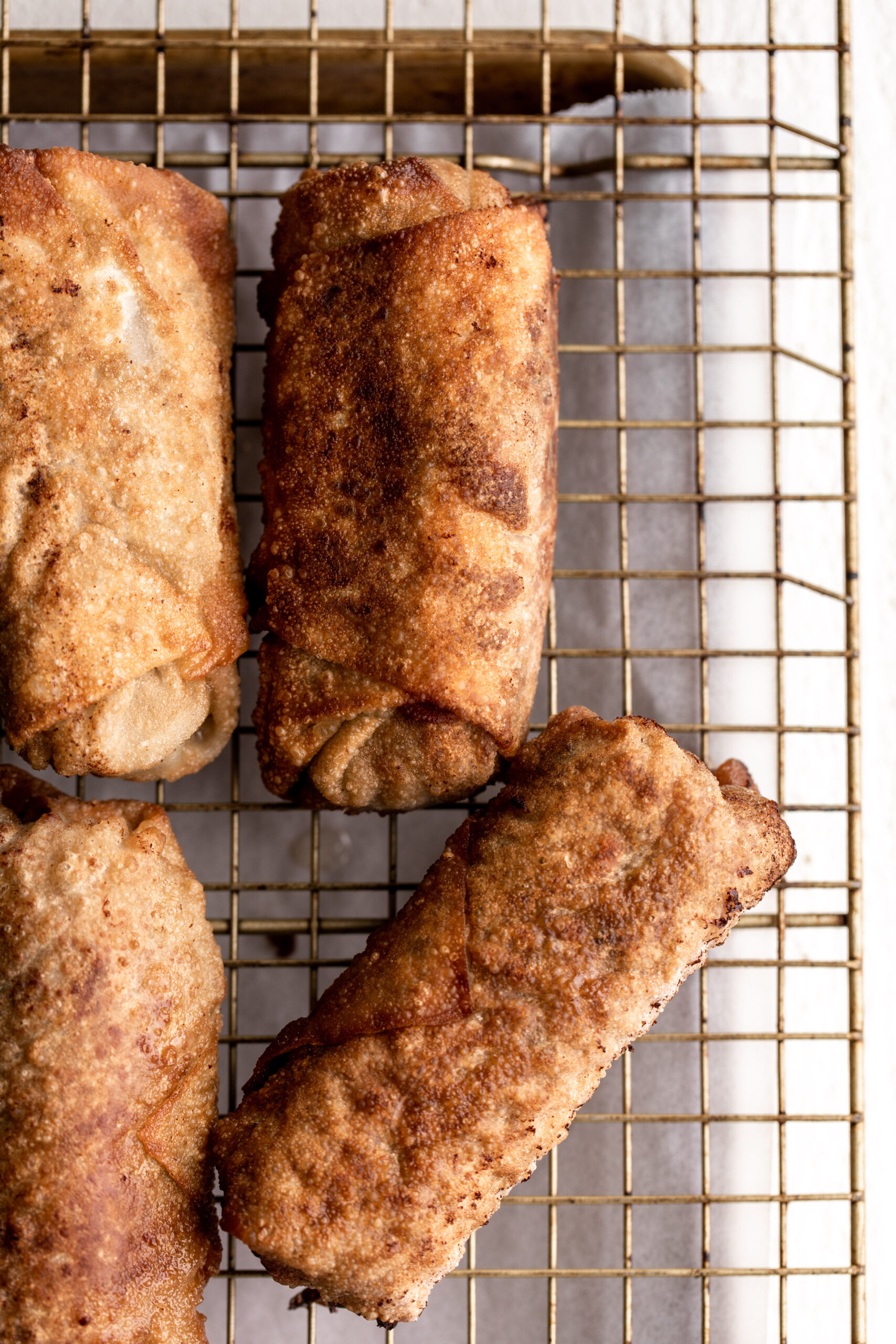 Cheesesteak Egg Rolls Cooking with Cocktail Rings