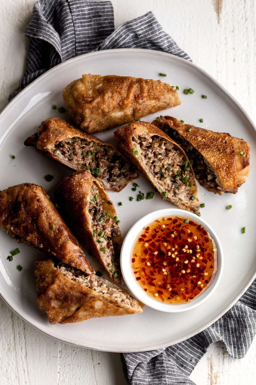Cheesesteak Egg Rolls Cooking with Cocktail Rings