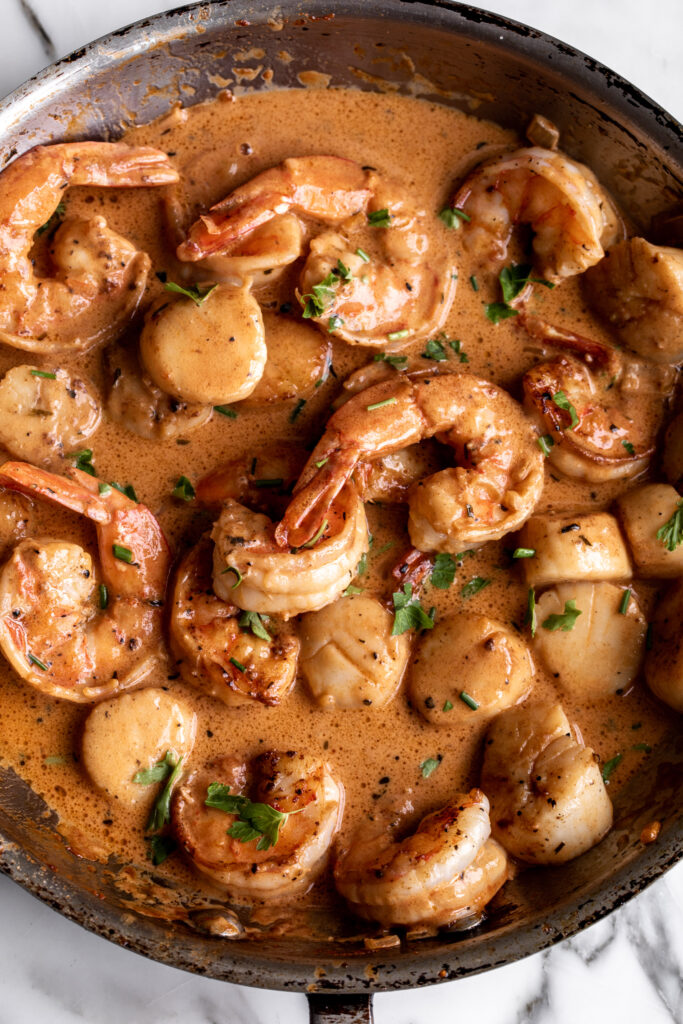 shrimp and scallops in creamy seafood sauce