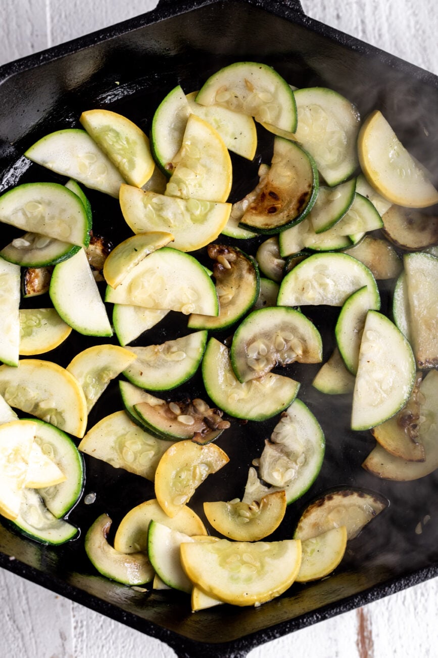 cooking Cook the zucchini and yellow squash for Summer Vegetable Risotto.