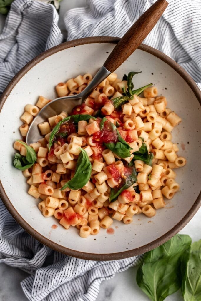 4 ingredient no cook easy tomato sauce over ditalini.