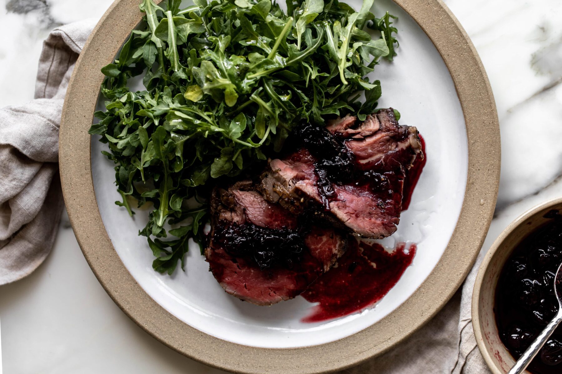 peppercorn crusted beef tenderloin with cherry port sauce.
