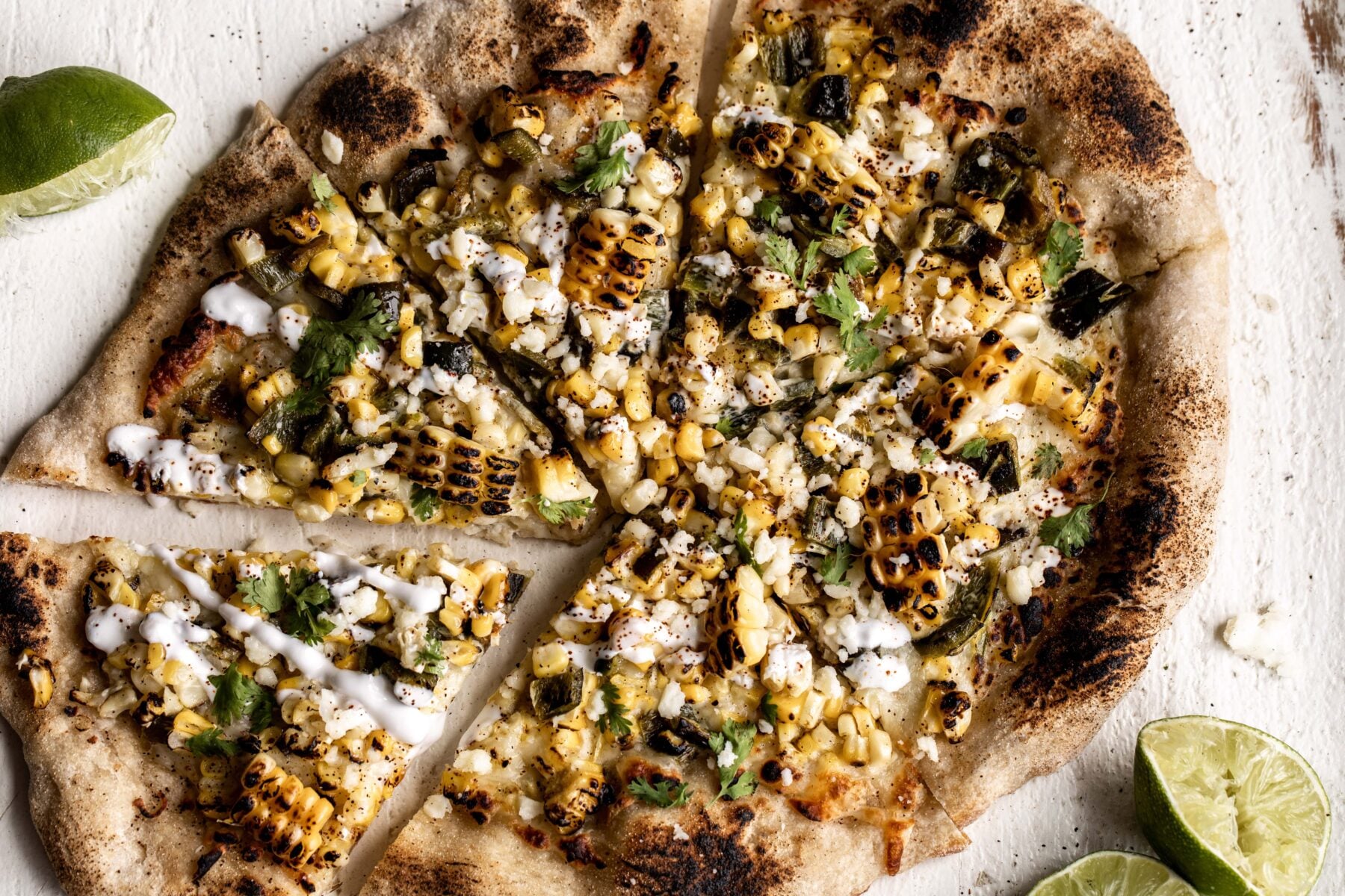elote pizza with charred corn.