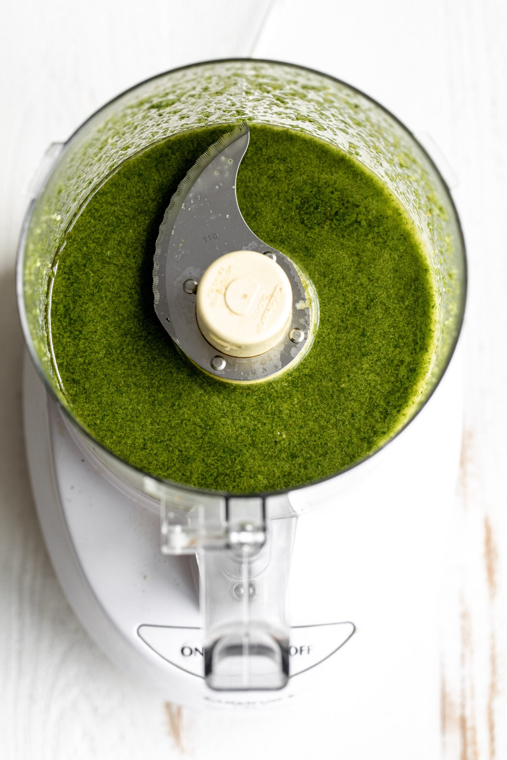 basil garlic oil in food processor.