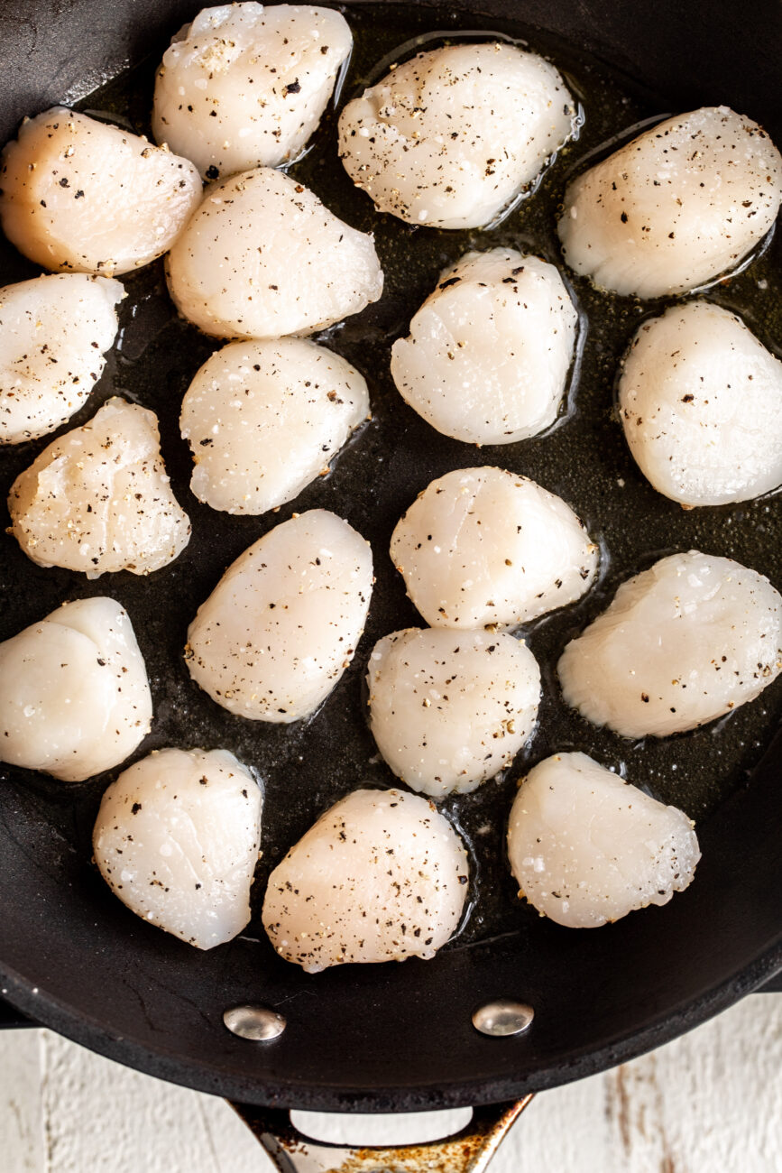 seared scallops in nonstick pan.