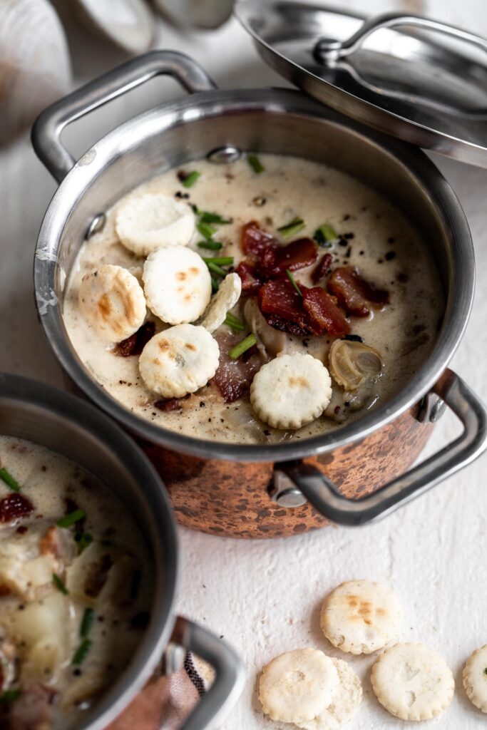 New england clam chowder with oyster crackers chives and bacon