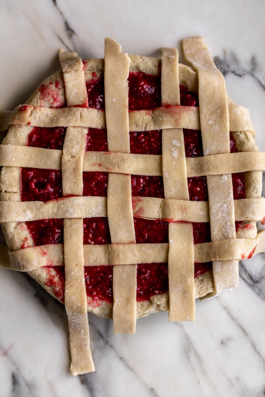 Raspberry shortbread pie with lattice top.