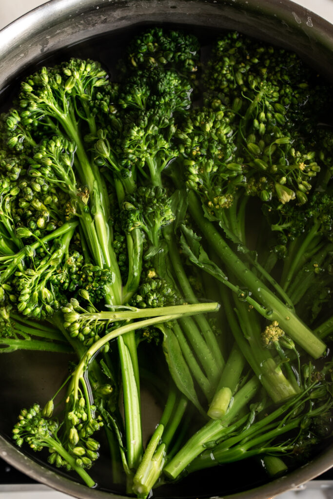 boiled broccolini in salted water
