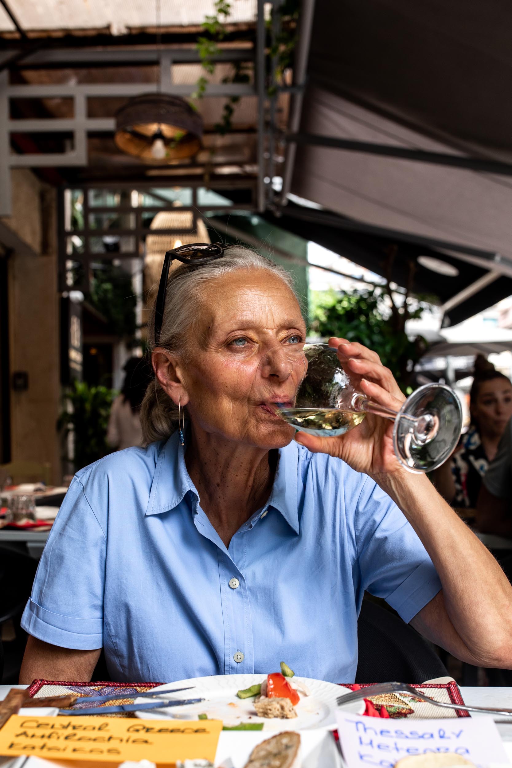 woman drinking wine during a Week in Thessaloniki