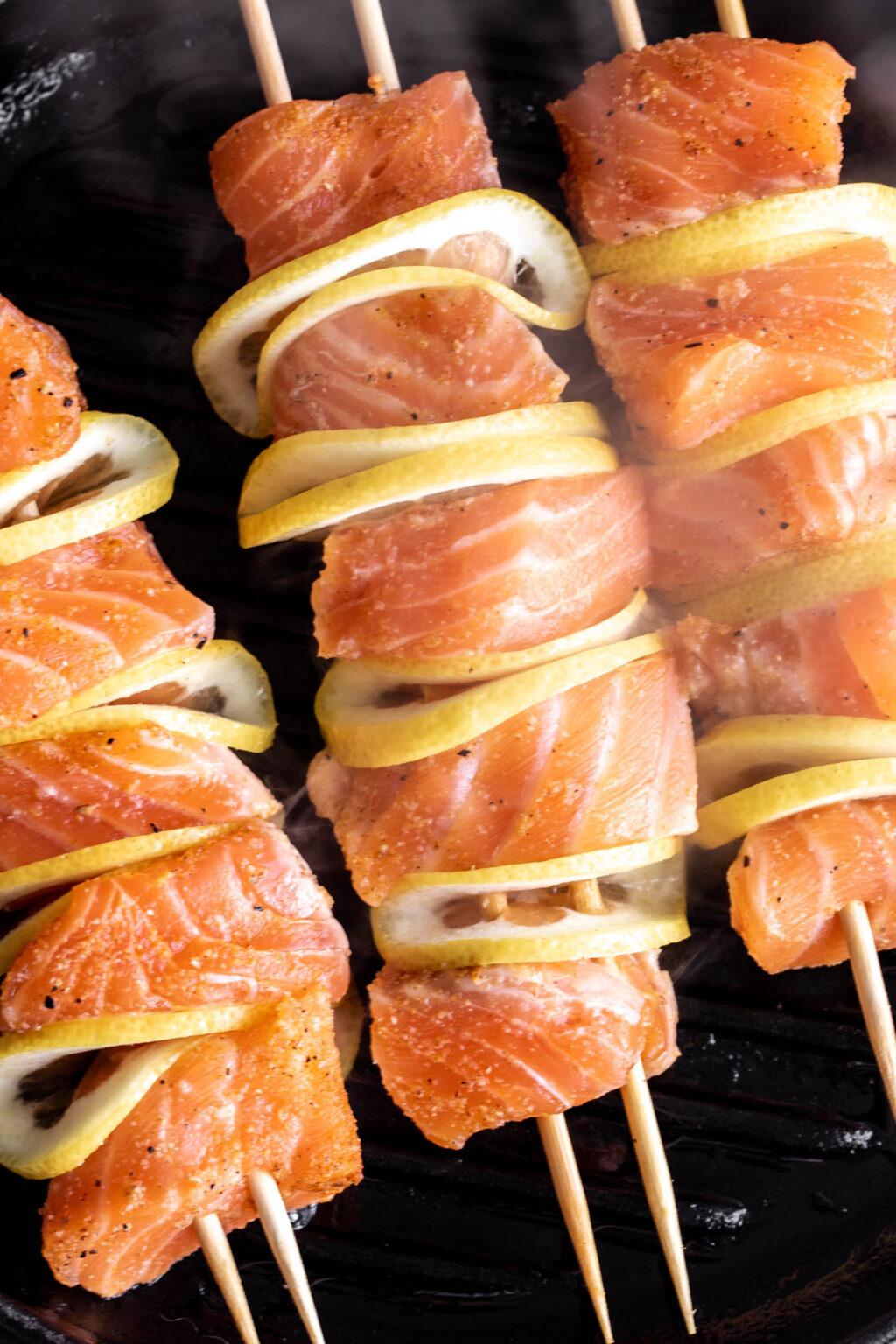Grilled Salmon Skewers Cooking with Cocktail Rings