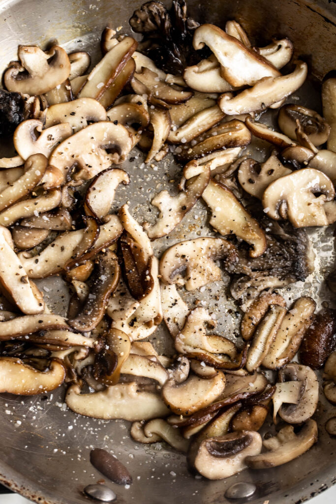 mixed mushrooms in sauté pan