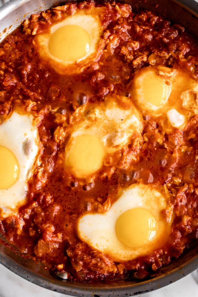 how to make shakshuka recipe spicy baked eggs