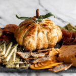 Baked brie pumpkin with spiced maple pumpkin butter.