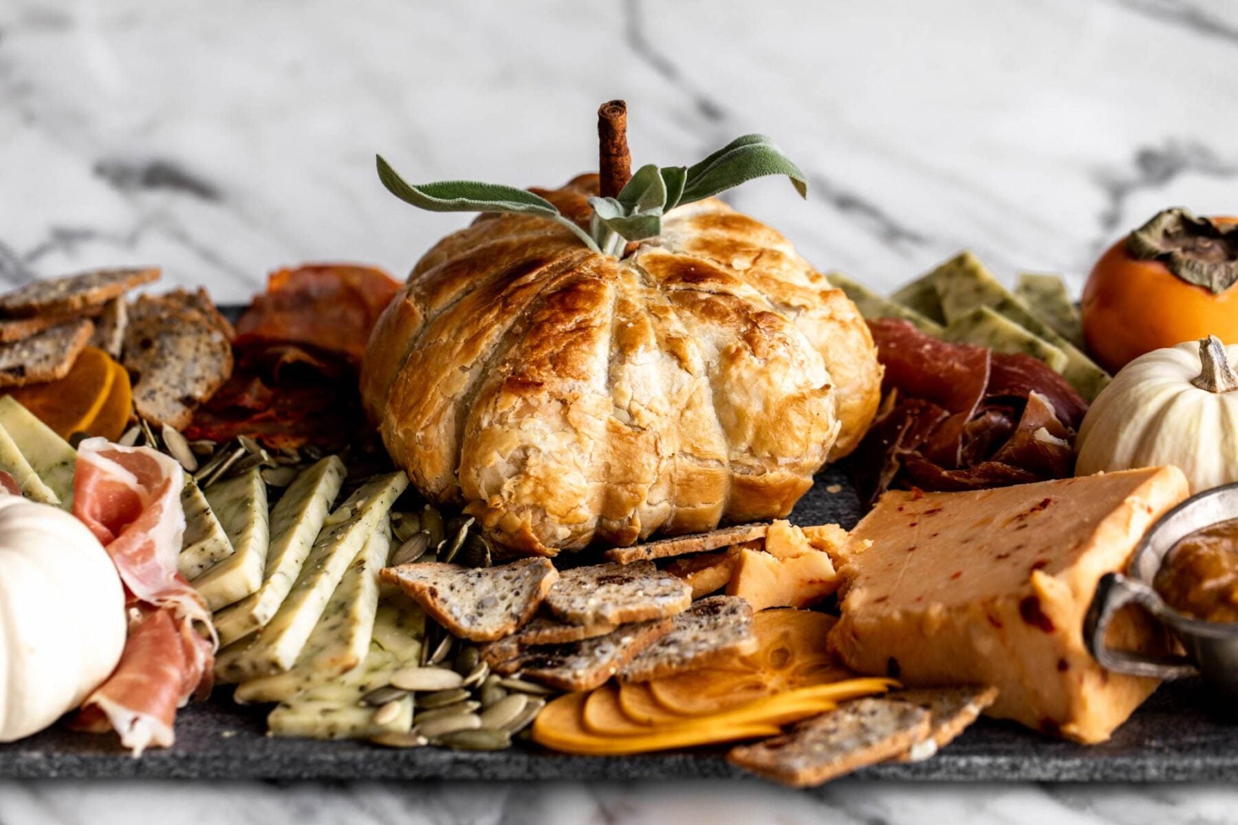 Baked brie pumpkin with spiced maple pumpkin butter.