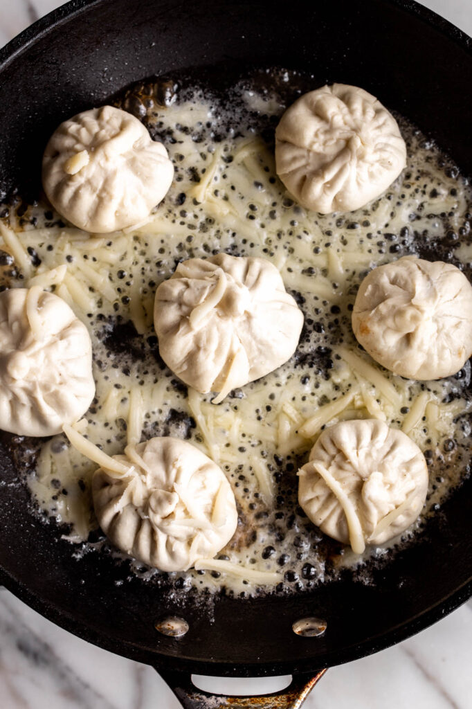 pan-fried dumplings with gruyere cheese