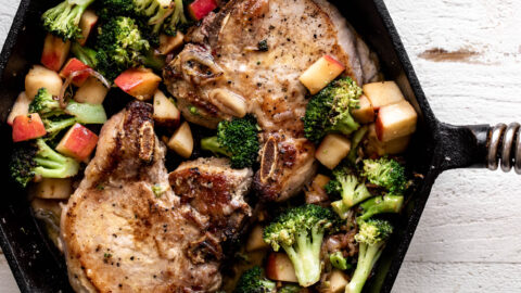 Pan-Seared Miso Butter Pork Chops with Sautéed Broccoli and Apples in cast iron