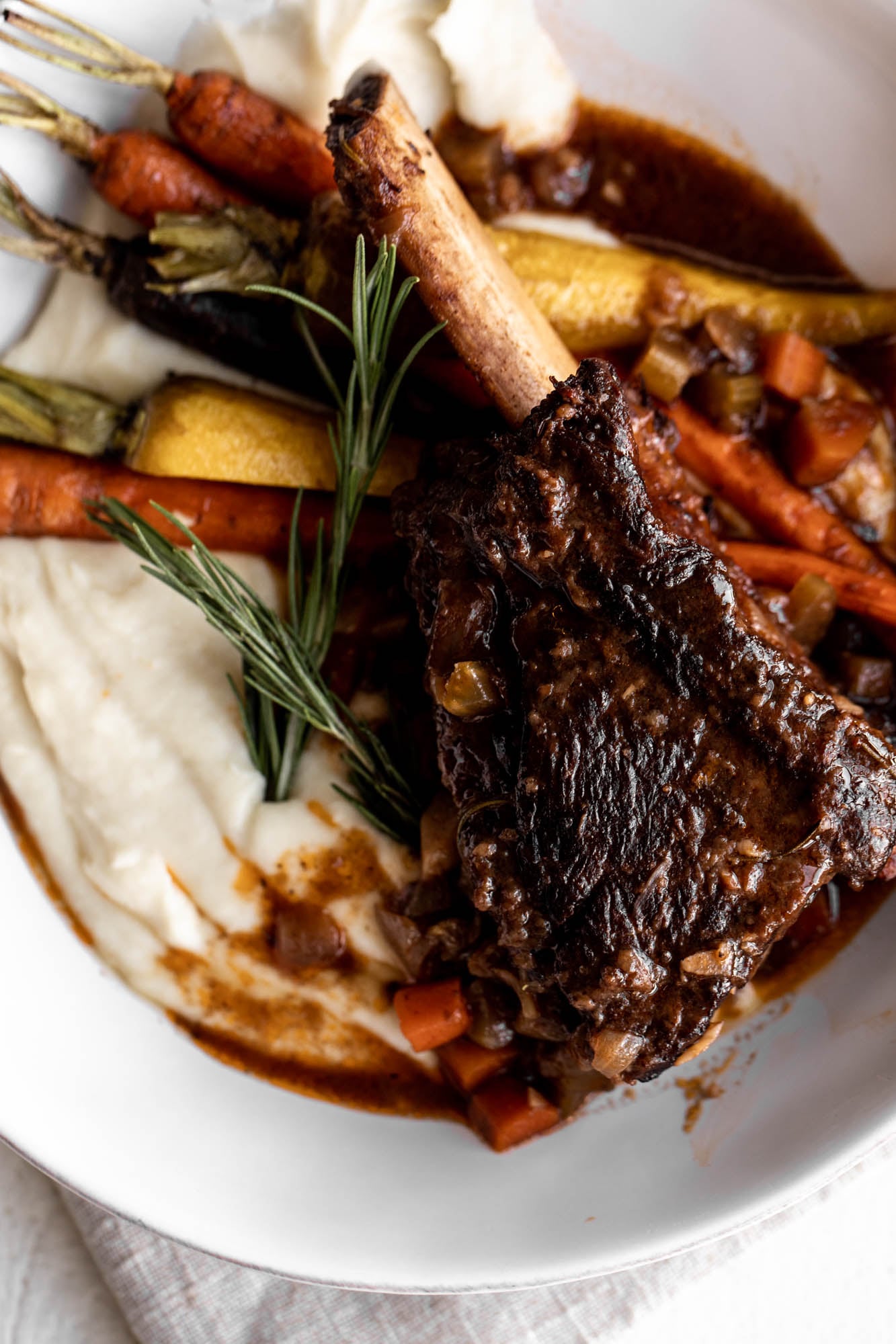 red wine braised short ribs recipe over celery root puree.