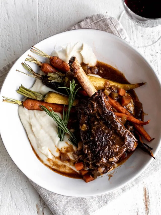 Savory red wine braised short ribs served with creamy mashed potatoes and carrots.