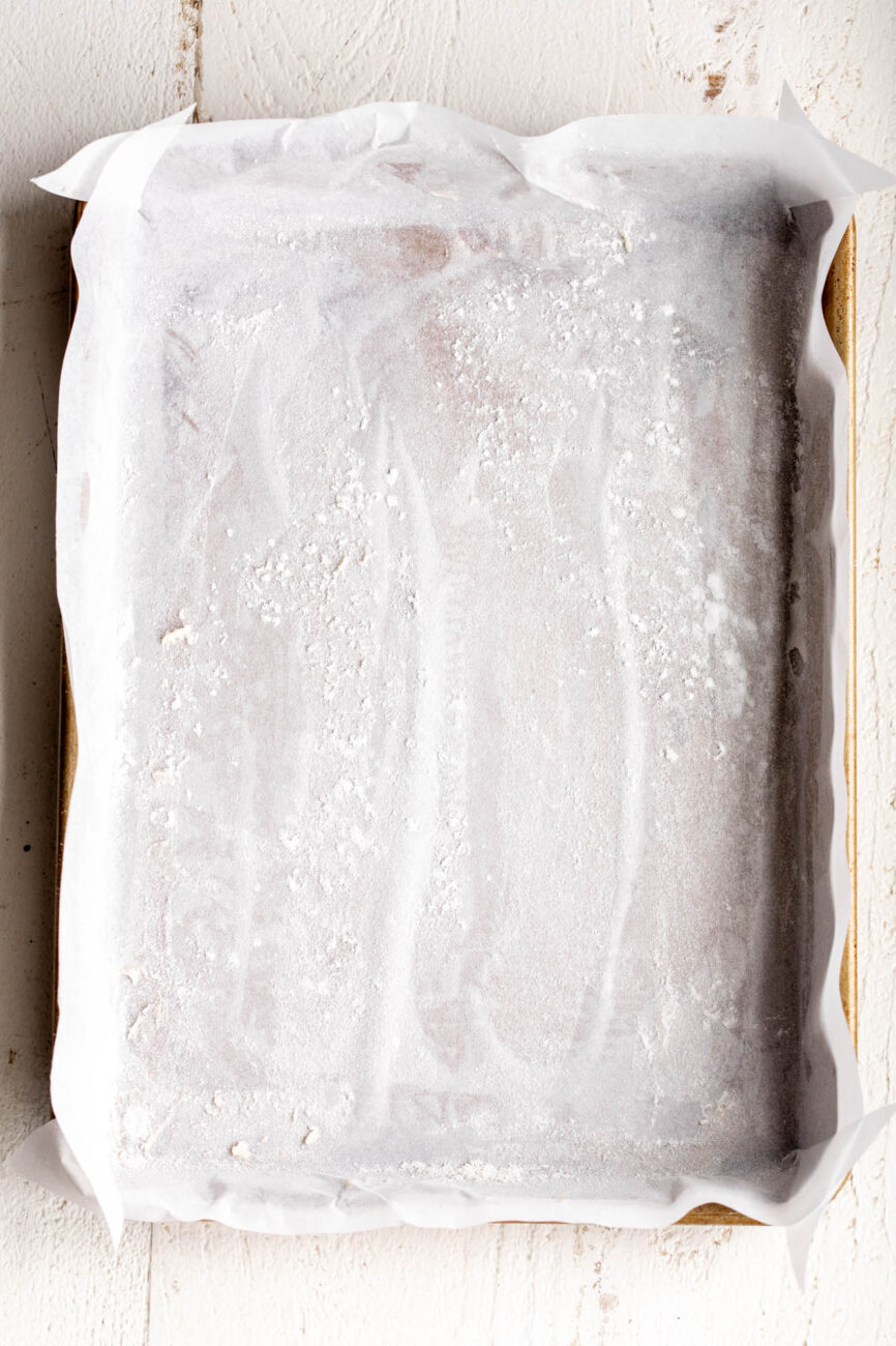jelly roll pan with prepared parchment paper.