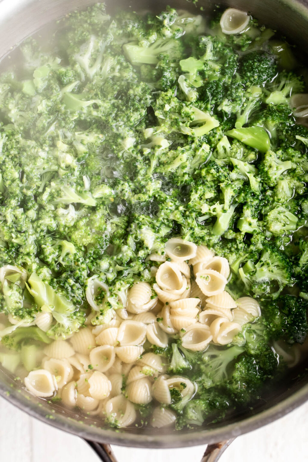 Broccoli Cheddar Mac and Cheese Cooking with Cocktail Rings