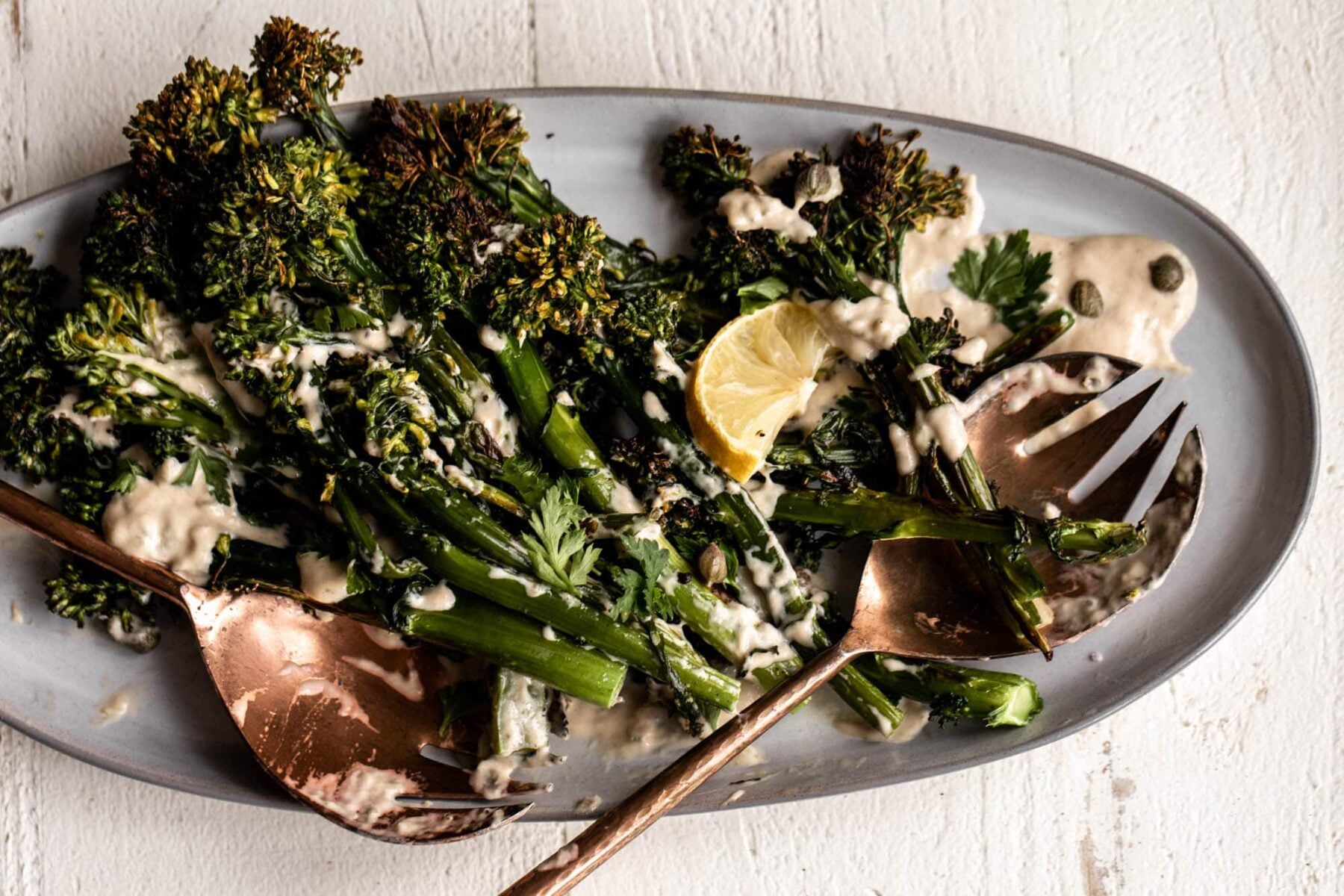 Charred broccolini with tonnato sauce and lemon.