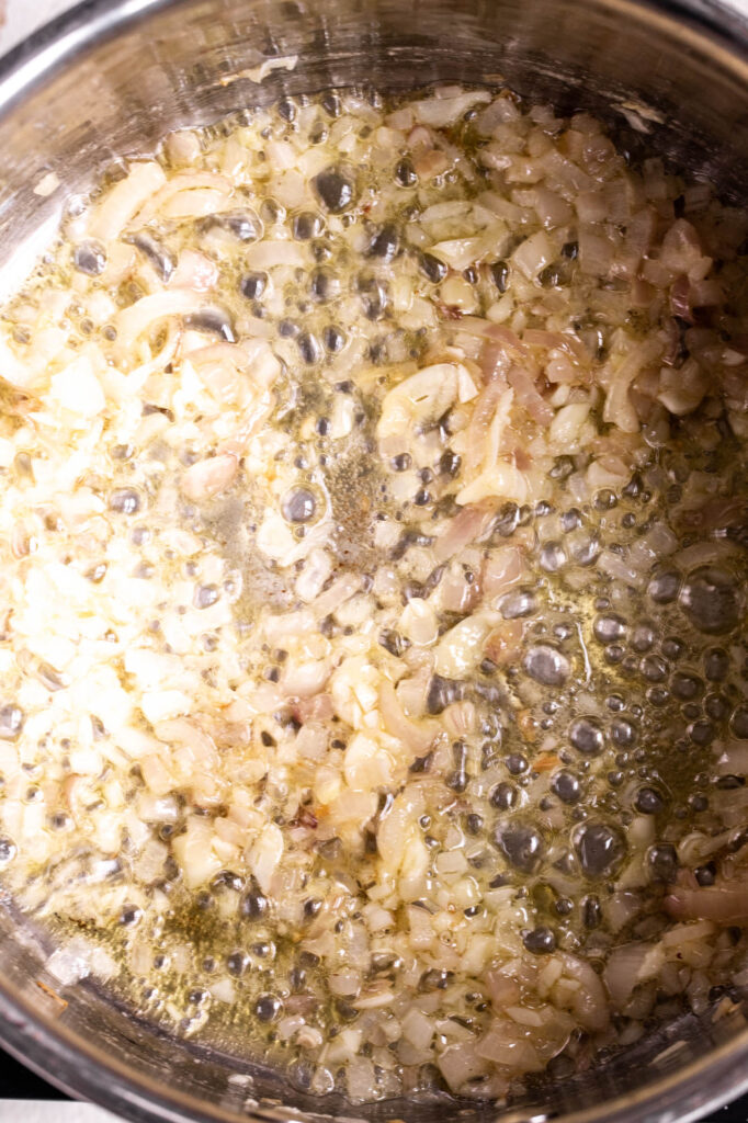 sautéed shallots and garlic in pan