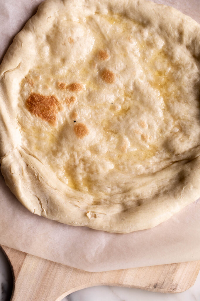 par baked dough for Baked Potato Pizza 