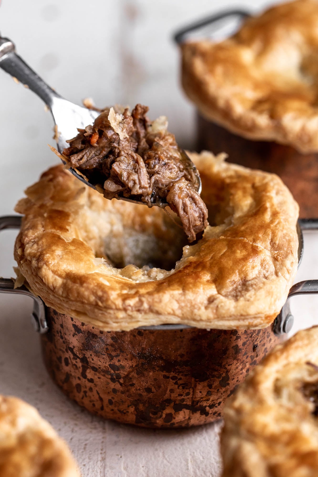 stout braised steak and mushroom pot pie with flakey pastry crust.